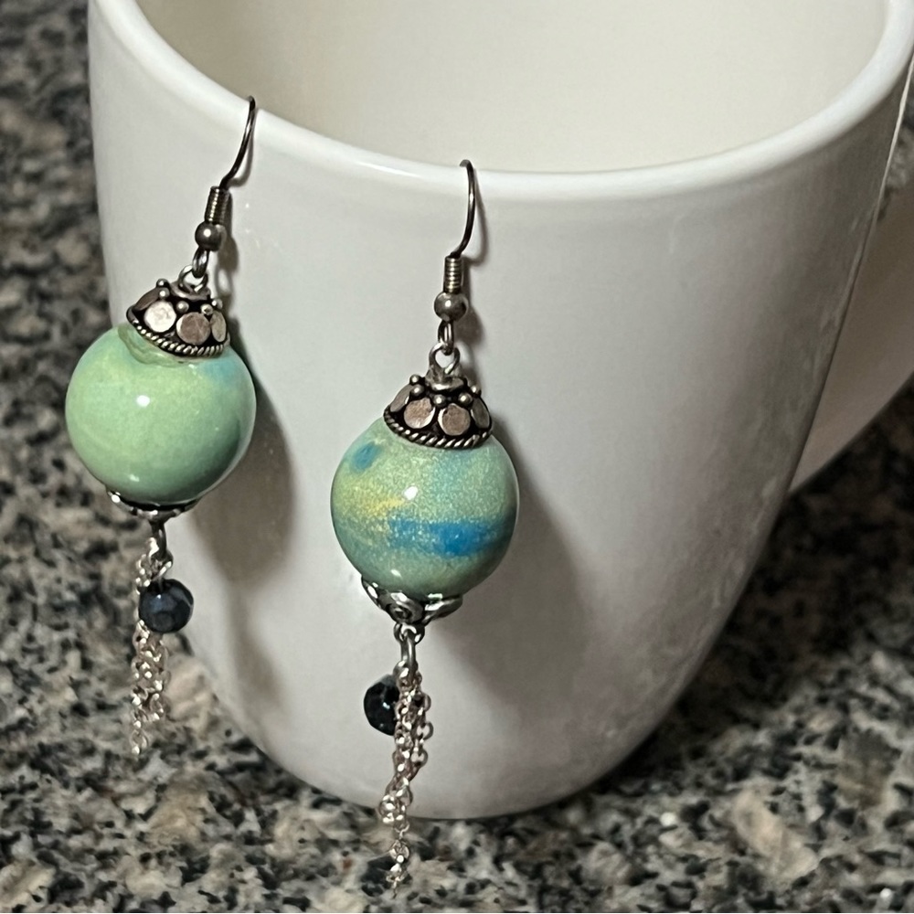Drop earrings with blue-green bead and black crystal dangle on silver-tone chain